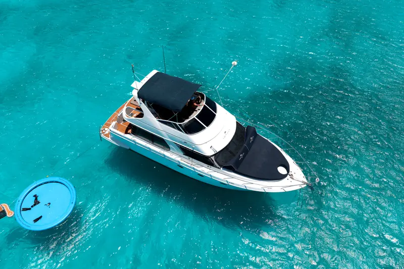 Eden Luca Blue from above with her teak aft deck and the SunChill float in turquoise water